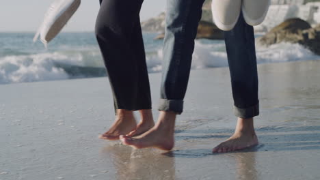Closeup-on-feet-of-free-young-couple-walking