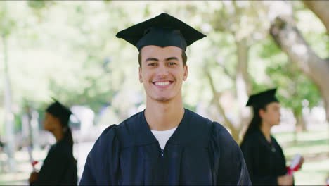 Portrait-of-a-proud-male-student-graduating