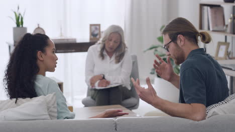 young-interracial-couple-arguing-during-a-therapy
