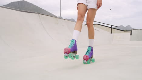 Closeup-of-a-woman-roller-skater's-legs-skating