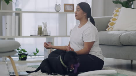 Plus-size-woman-meditating-in-her-home-living