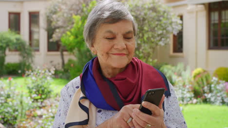 Retirement-woman-and-social-media-memory-on-phone