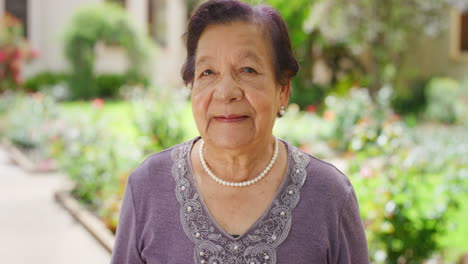 Senior-woman,-retirement-portrait-and-garden