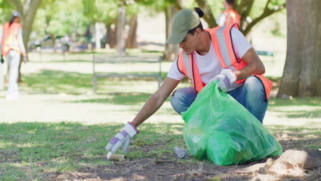 Male-volunteer-cleaning-a-park-in-his-community