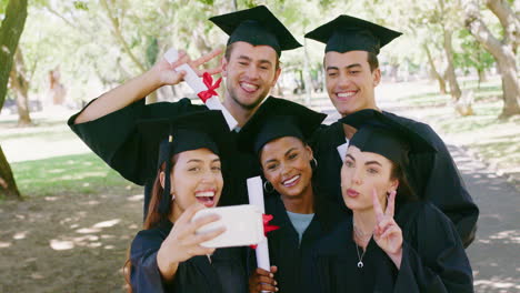 Group-of-graduates-using-phone-for-social-media