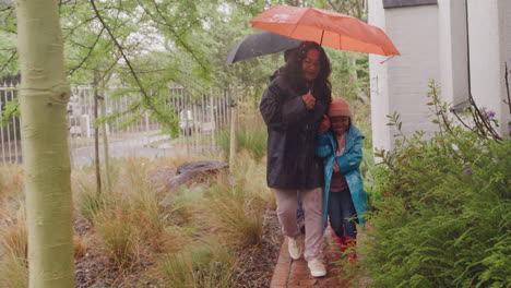 Grandparents-and-grandchildren-running-in-the-rain