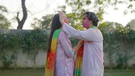 Indian-couple-laughing-and-giggling-at-a-Holi-festival