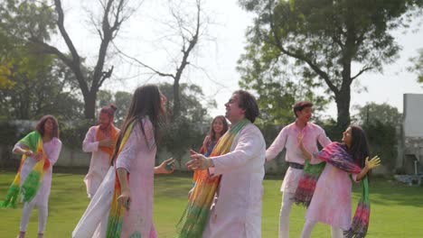 Indian-people-celebrating-Holi-festival-in-a-park