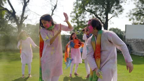 Indian-man-throwing-color-at-his-wife-in-a-Holi-event