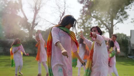 Group-of-Indian-people-dancing-at-a-Holi-party