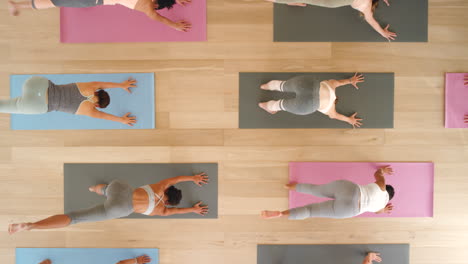 Health,-training-and-yoga-class-overhead-by-woman