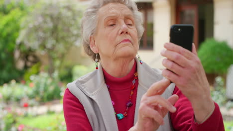 Senior-woman,-confused-and-phone-selfie