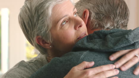 Love,-support-and-hug-with-a-senior-couple-hugging
