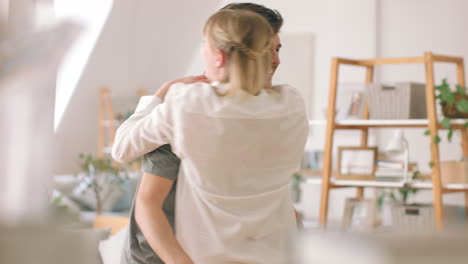 Love,-couple-and-happy-hug-in-home