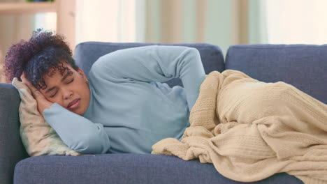 Woman-suffering-from-PMS-pain-while-laying