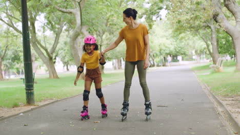 Single-mother-skating-with-her-adopted-daughter