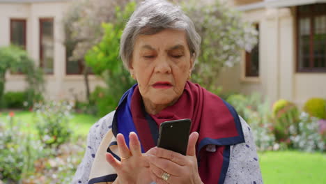 Mobile,-phone-and-senior-woman-scroll