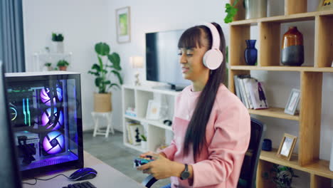 Young-female-gamer-playing-video-game-console
