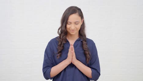 Indian-girl-doing-Namaste-and-greeting