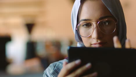 Digital-tablet,-analytics-and-muslim-woman-working