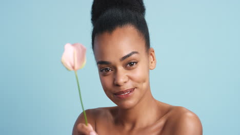 Black-woman,-peace-lily-flower