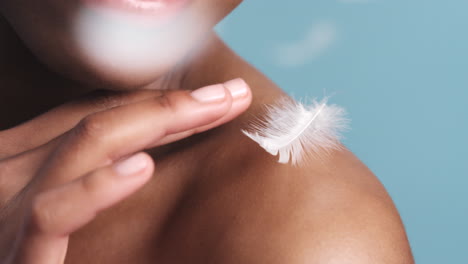 Skincare,-feather-and-black-woman-at-beauty