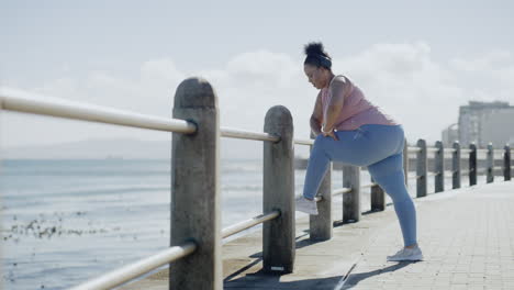 One-plus-size-overweight-woman-stretching-legs-to