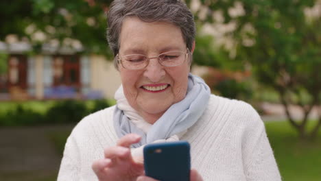 Phone,-backyard-and-senior-woman-on-social-media