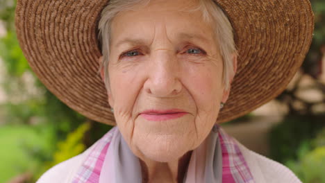 Portrait-of-an-elderly-woman-in-a-green-garden