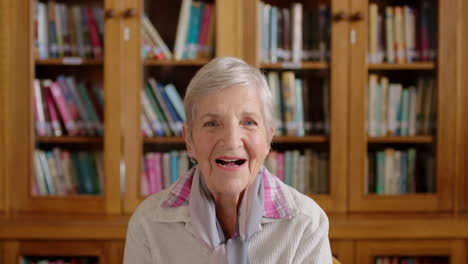 Happy-elderly-woman,-laugh-in-library
