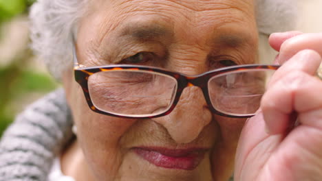 Senior-woman,-stress-or-headache-from-glasses-eyes