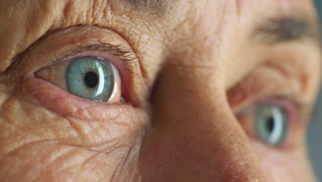 Senior-woman,-blue-eyes-and-vision-in-thinking