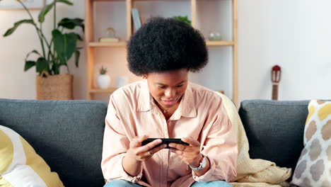 Excited-woman-playing-games-on-her-phone