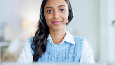 Portrait-of-a-call-center-agent-using-a-headset
