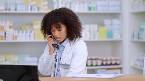 Friendly-pharmacist-talking-on-a-phone-call