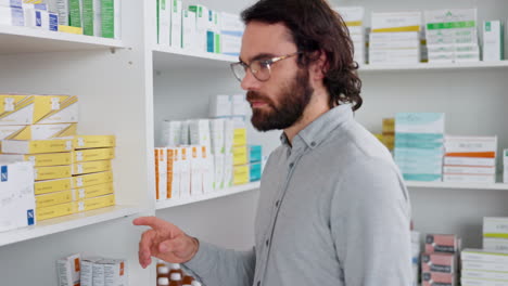 Patient-reading-pharmacy-medication-box