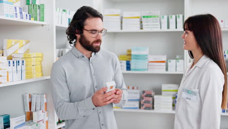 Sick-customer-being-assisted-by-a-pharmacist