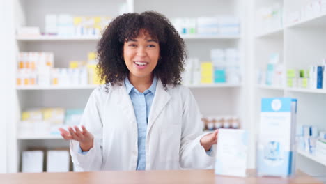 Happy-female-chemist-welcoming-customer-to