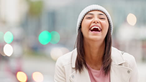 Winter-portrait-of-laughing-trendy-girl-with-bokeh