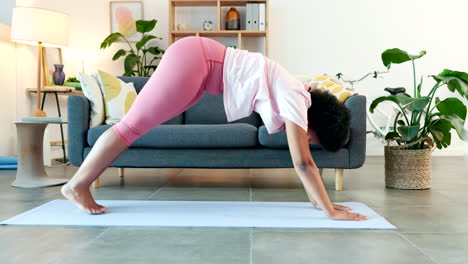Yoga-woman-stretching-in-downward