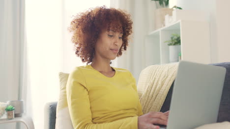 Portrait-of-a-black-woman-working-remotely