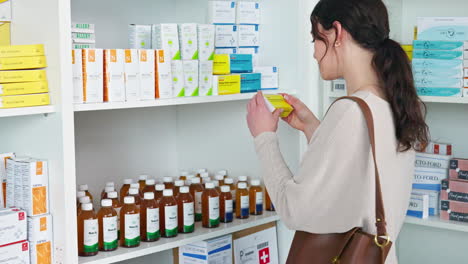 Customer-in-pharmacy,-choosing-medication