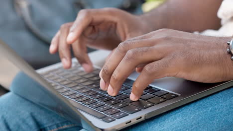 Closeup-of-a-man-typing-on-a-laptop-keyboard