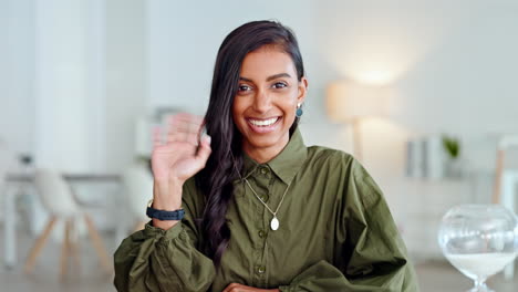 Young-business-woman-waving-hand
