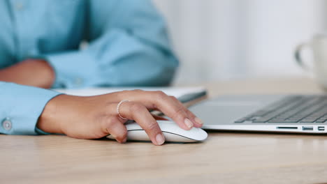 Business-woman-hands-clicking-a-computer-mouse