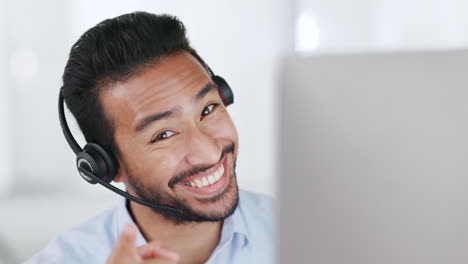 Laughing-call-centre-agent-wearing-headset