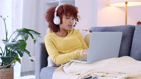 Happy-woman-enjoying-music-streaming-service