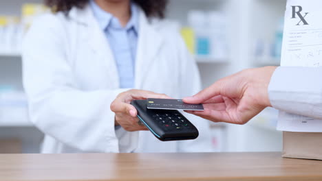 Customer-paying-with-card-for-prescription