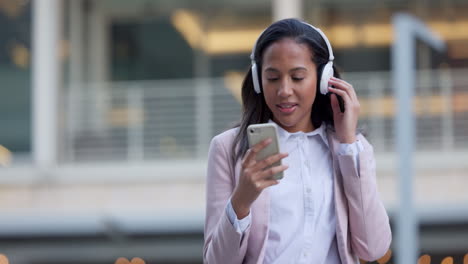 Funky-woman-using-a-phone-and-listening-to-music