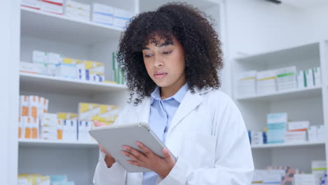 Professional-pharmacist-typing-drug-prescription